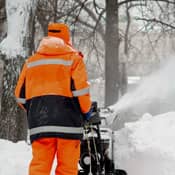 Snow blowing person